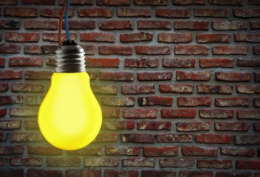 Yellow light bulb and wall background.