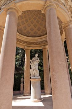 Sculpture woman in gazebo. Park labyrinth Barcelona. Spain
