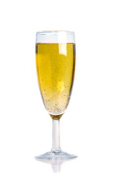  Closeup of the bubbles in a glass of champagne on white background