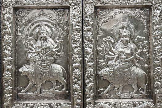 Durgiana Hindu Temple. Detail of ornate silver panels decorating the door to the inner sanctum. Amritsar, Punjab, India