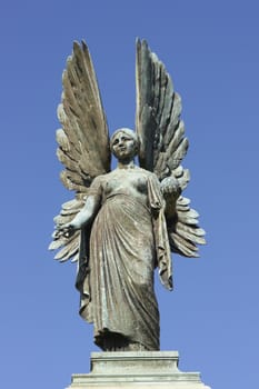 Statue of an angel in Parade Gardens, Bath, Somerset, England in memory of King Edward VII.