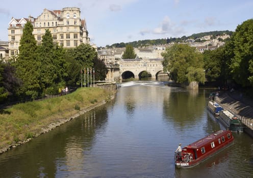 Narrow boat in the River Avon in Bath, Somerset, England.