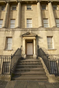 House in the historic Royal Crescent. Large crescent of houses made from locally mined bath stone. Bath, Somerset, England