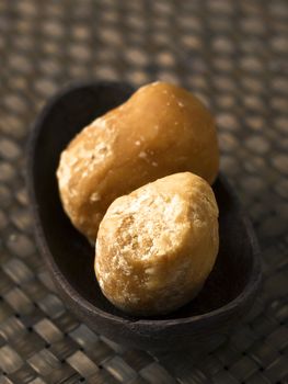 close uo of a bowl of jaggery balls