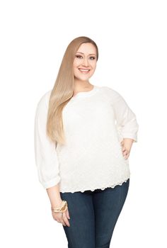 Blonde xxl woman standing on white backround, smiling at camera