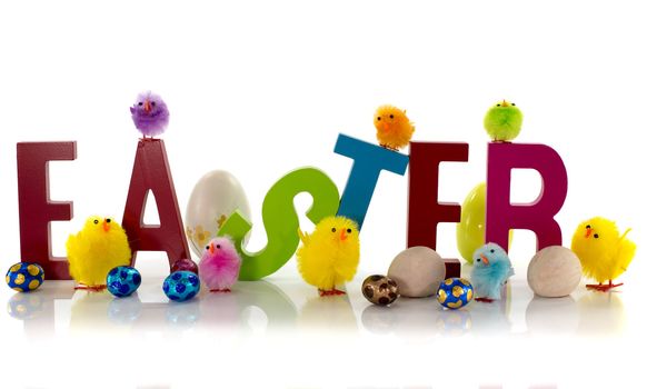 easter eggs and chicks on white background