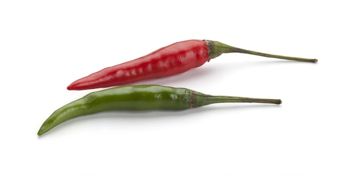 Two isolated hot chili peppers on the white
