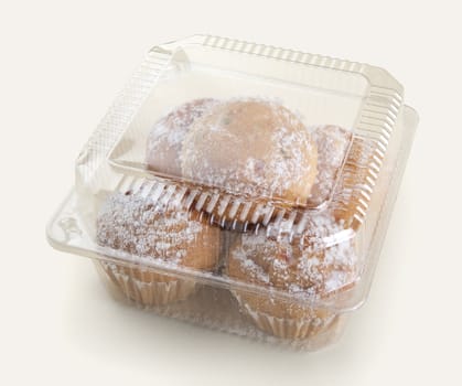 Some cakes in the plastic box