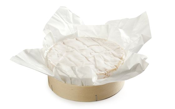 Whole camambert cheese in the wood package