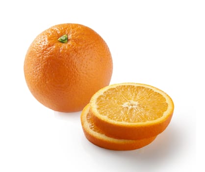 Whole and pieces of orange on the white