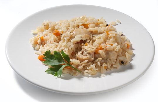 Pilau and pardley leaf on the white plate