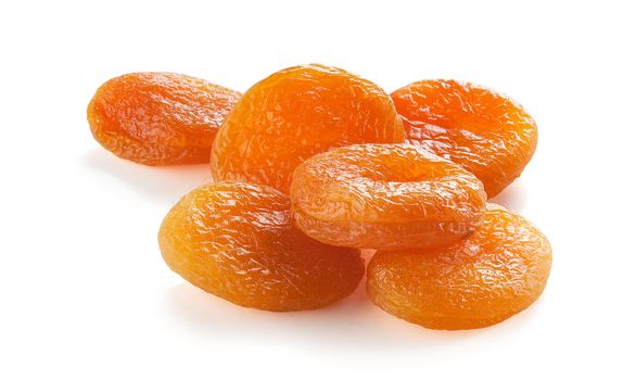 Some dried apricots on the white background