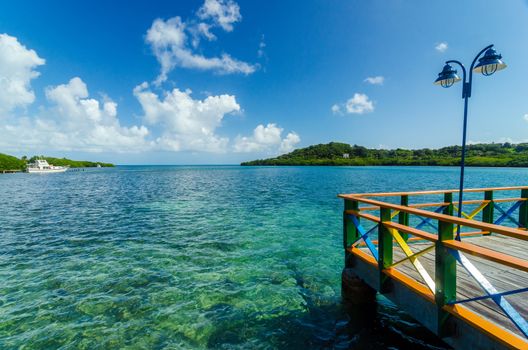 Colorful bridge connecting two tropical islands in San Andres y Providencia, Colombia
