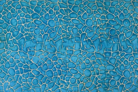 Blue Arts on mulberry paper background.