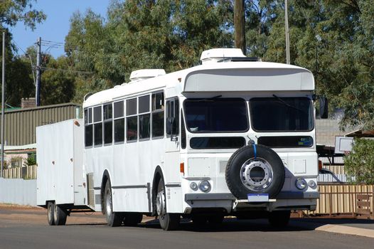 bus arranged in camp-site because