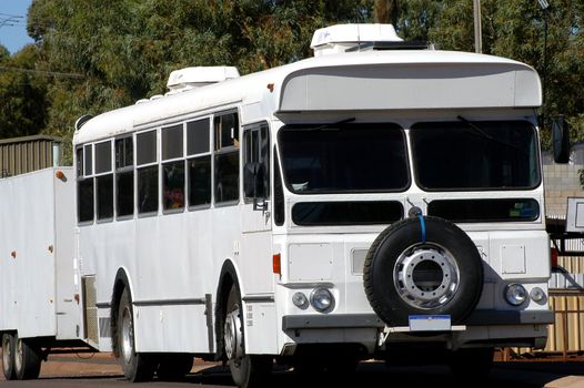 bus arranged in camp-site because