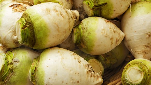 Pile of Green and white turnips at the farmers market