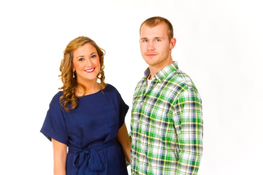 An attractive couple against a white background in the studio to create this isolated portrait.