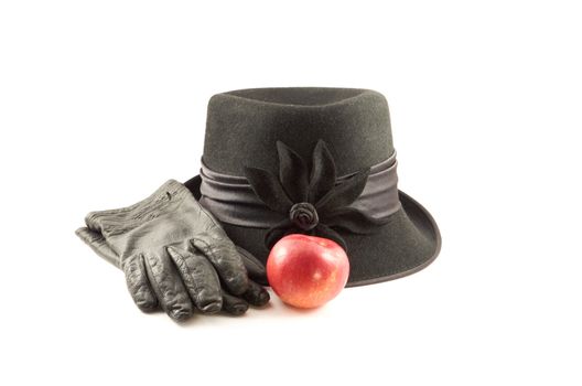 Black women's hat and gloves on a white background of isolation