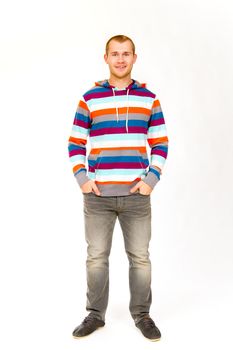 A fashion portrait of a guy in the studio against a white isolated background.