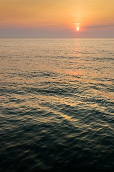 Sunrise on Dark Sea in The morning