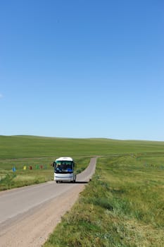 Bus in Hulun Buir grassland of Inner-Mongolia, China