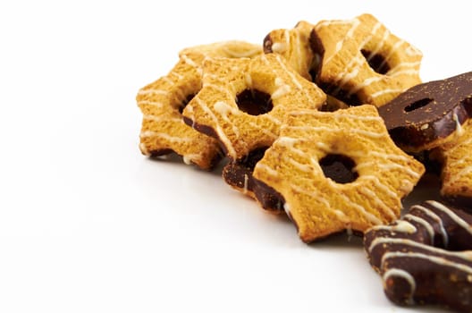 Shortbread cookies with milk or chocolate glaze on a white background