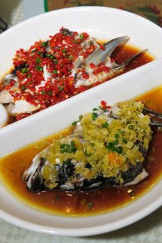 Chinese style steamed Fish head with diced hot red peppers