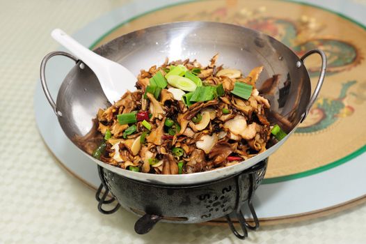 Chinese Hunan cuisine - griddle cooked wild mushrooms