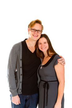 A man and woman pose for this family portrait in the studio against an isolated white background.