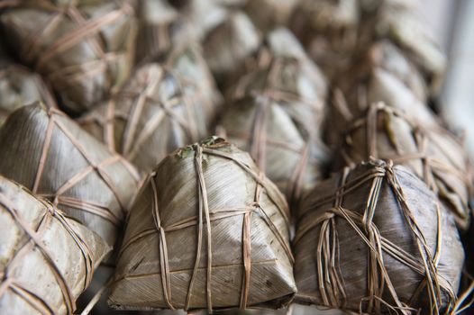 Chinese rice dumplings wrapped in reed leaves
