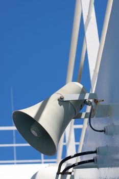Wallmounted loudspeaker on the deck of a ship