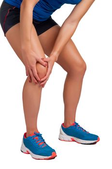 Young woman with pain in her knee, isolated in white