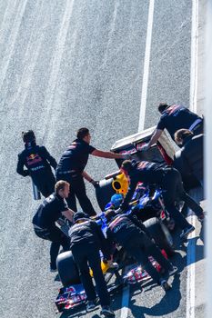 JEREZ DE LA FRONTERA, SPAIN - FEB 10: Sebastian Vettel of Red Bull F1 entering to the pit on training session on February 10 , 2012, in Jerez de la Frontera , Spain