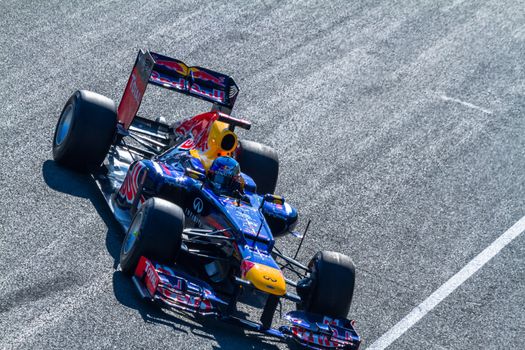 JEREZ DE LA FRONTERA, SPAIN - FEB 10: Sebastian Vettel of Red Bull F1 entering to the pit on training session on February 10 , 2012, in Jerez de la Frontera , Spain