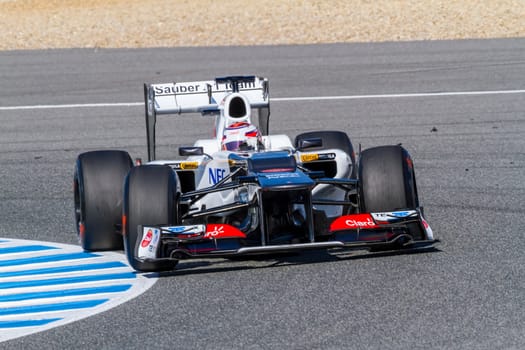 JEREZ DE LA FRONTERA, SPAIN - FEB 10: Kamui Kobayashi of Sauber F1 races on training session on February 10 , 2012, in Jerez de la Frontera , Spain
