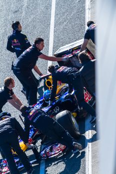 JEREZ DE LA FRONTERA, SPAIN - FEB 10: Sebastian Vettel of Red Bull F1 entering to the pit on training session on February 10 , 2012, in Jerez de la Frontera , Spain