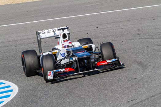 JEREZ DE LA FRONTERA, SPAIN - FEB 10: Kamui Kobayashi of Sauber F1 races on training session on February 10 , 2012, in Jerez de la Frontera , Spain