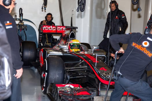 JEREZ DE LA FRONTERA, SPAIN - FEB 10: Lewis Hamilton of McLaren F1 waiting on the pit on training session on February 10 , 2012, in Jerez de la Frontera , Spain