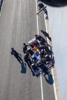 JEREZ DE LA FRONTERA, SPAIN - FEB 10: Sebastian Vettel of Red Bull F1 entering to the pit on training session on February 10 , 2012, in Jerez de la Frontera , Spain