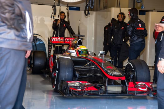 JEREZ DE LA FRONTERA, SPAIN - FEB 10: Lewis Hamilton of McLaren F1 waiting on the pit on training session on February 10 , 2012, in Jerez de la Frontera , Spain