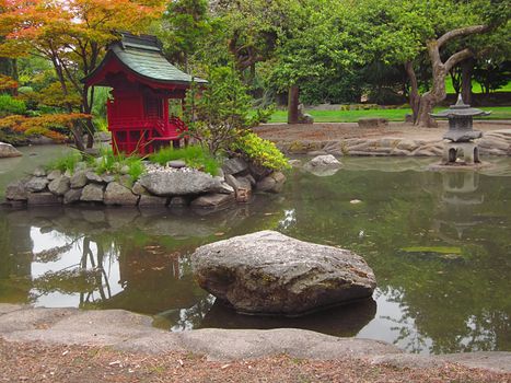 A photograph of an Asian style garden located at a public park.