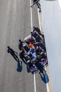 JEREZ DE LA FRONTERA, SPAIN - FEB 10: Sebastian Vettel of Red Bull F1 entering to the pit on training session on February 10 , 2012, in Jerez de la Frontera , Spain
