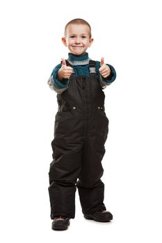 Little smiling child boy hands gesturing thumb up success sign