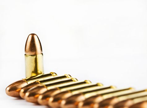 9 mm bullets on a white background isolated