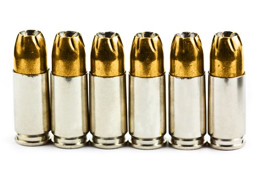 9 mm bullets on a white background isolated