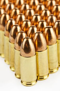 9 mm bullets on a white background isolated