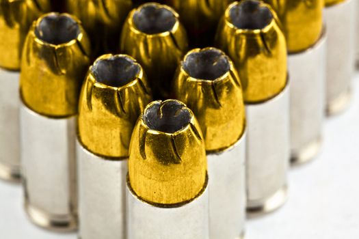 9 mm bullets on a white background isolated