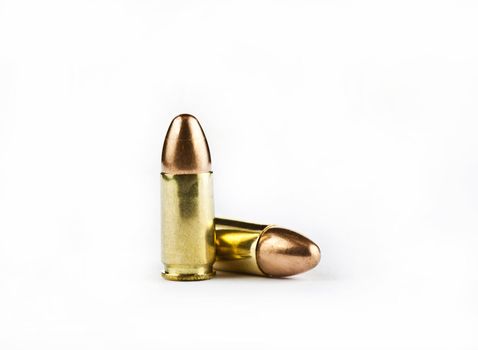 9 mm bullets on a white background isolated