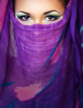 close up portrait of a pretty girl with a scarf